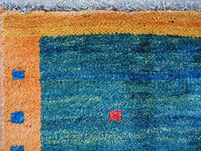 Hand woven wool area rug